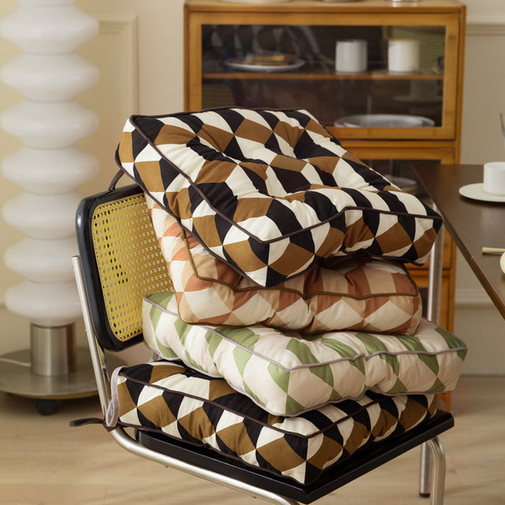 Padded chair cushion with ties and quilted tufted upholstery