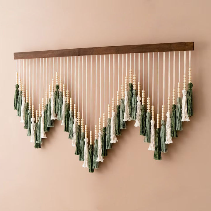 Artful macramé wall hanging with gradient and elegant tassels