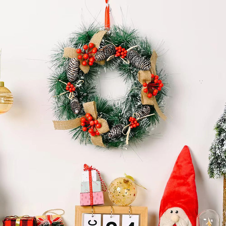 Festive Christmas wreath with pine cones and berries