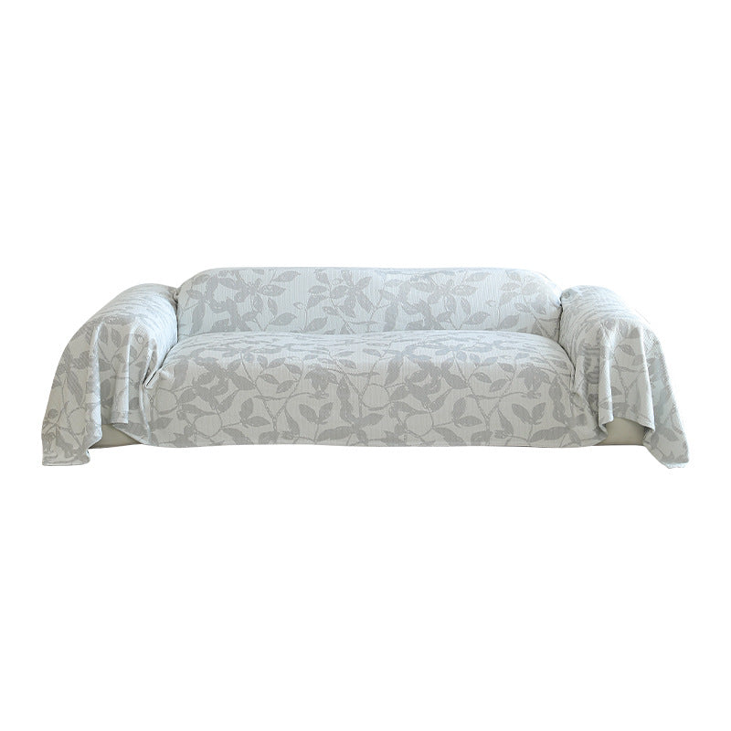 Generous sofa cover for 3-seater with floral jacquard structure