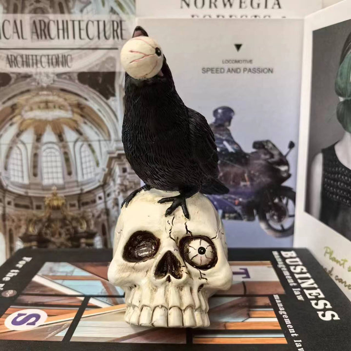 Decorative figure with raven on skull