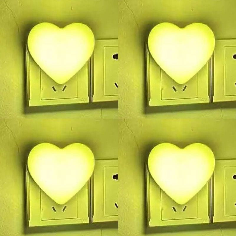 Heart-shaped plug-in ambient night light with soft LED lighting