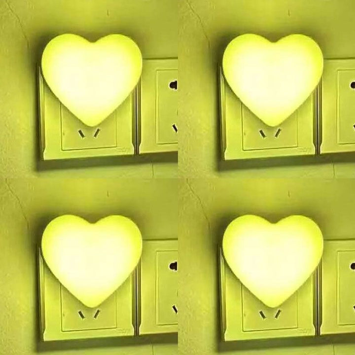 Heart-shaped plug-in ambient night light with soft LED lighting