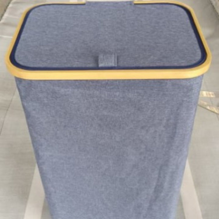 Stylish laundry basket with wooden lid