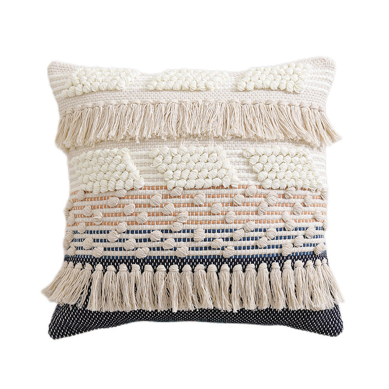 High-structured woven decorative cushion cover with fringes and bouclé application