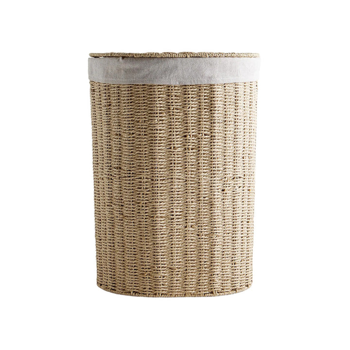 Round laundry basket made of natural materials