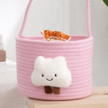 Storage basket with playful cloud motif