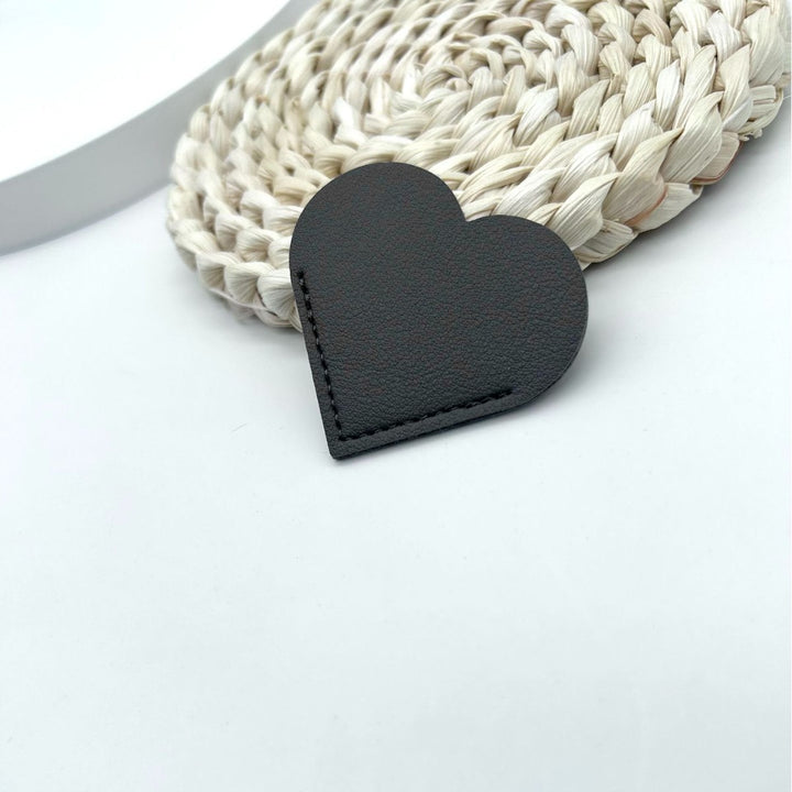 Heart-Shaped Leather Accessory