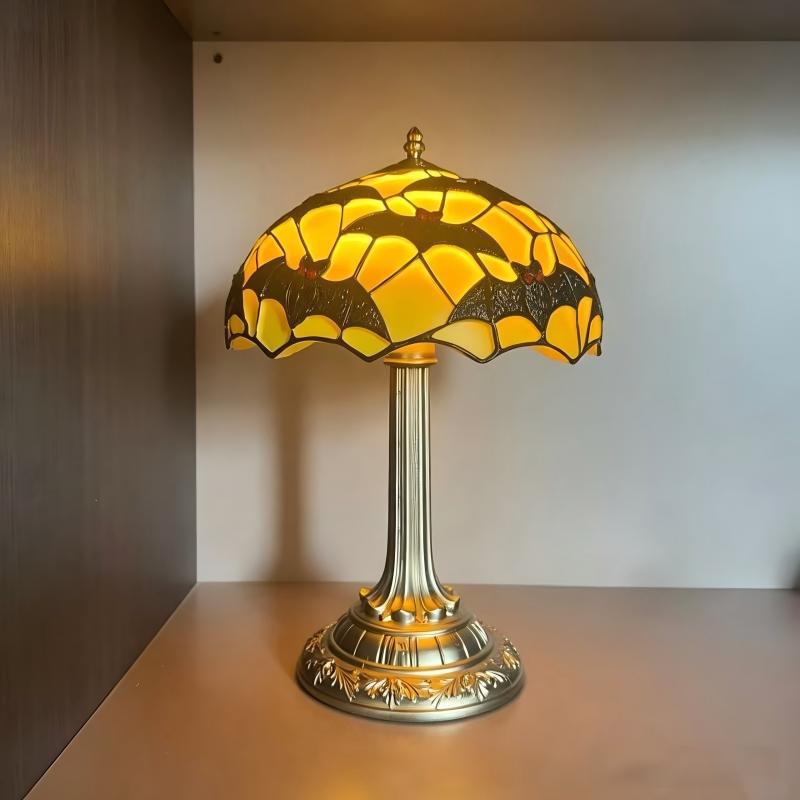 Decorative table lamp in bat design