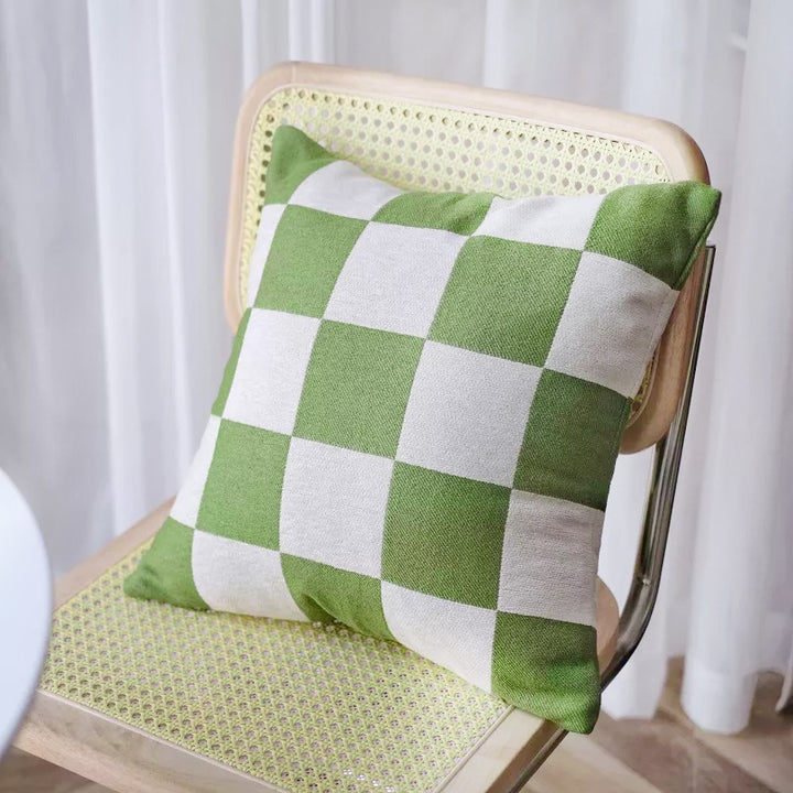 Square decorative cushion with woven checkered pattern and hidden zipper