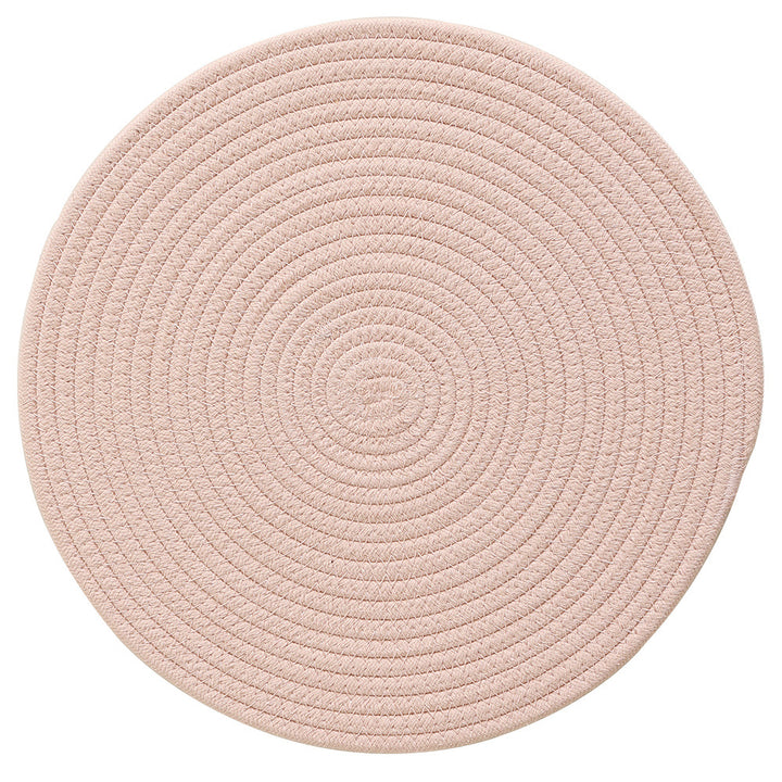 Braided round table mat made of cotton rope and sea grass with spiral structure