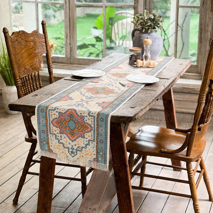 Woven table runner made of cotton blend with oriental medallion pattern and fringes
