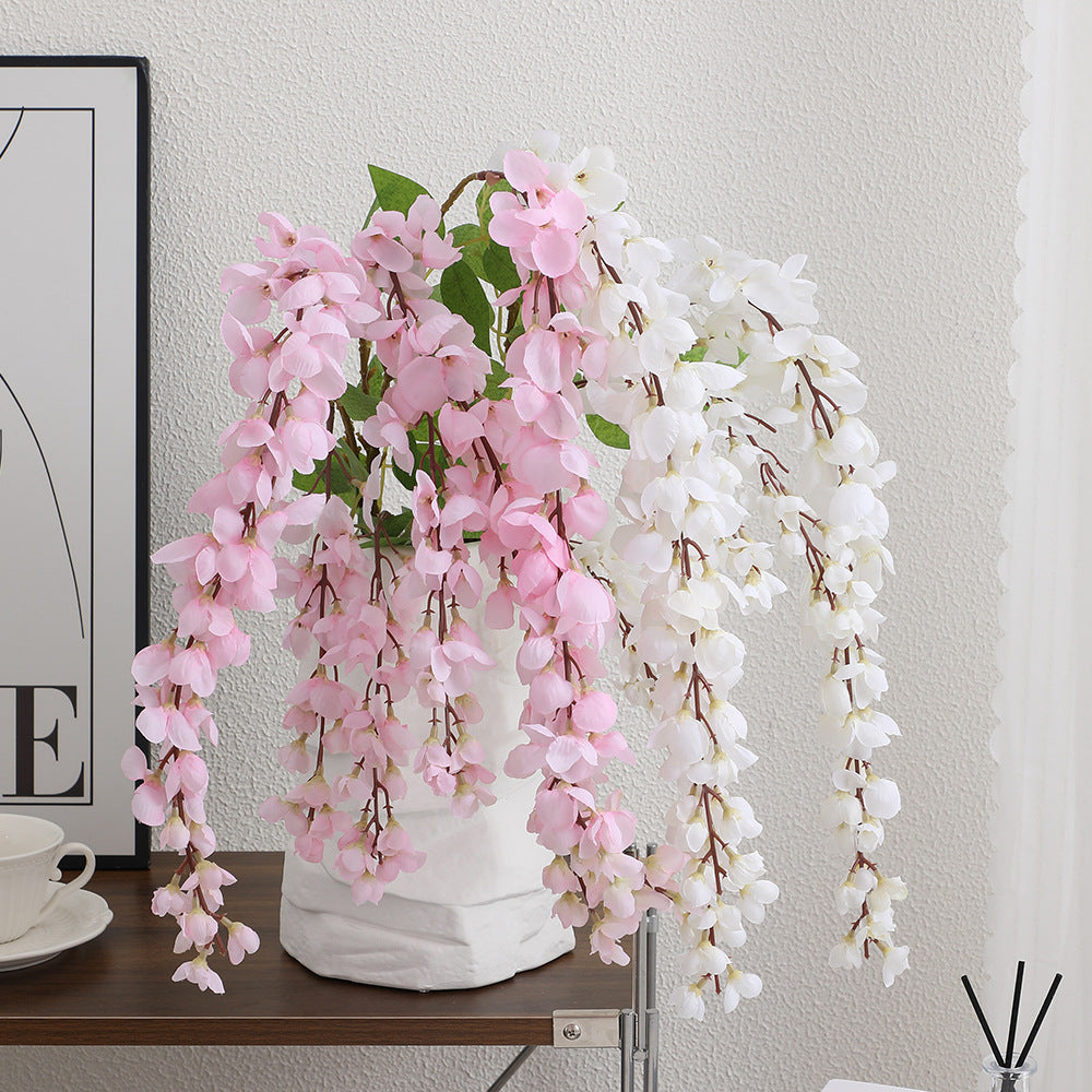 Artificial flower branch with elegant flowers