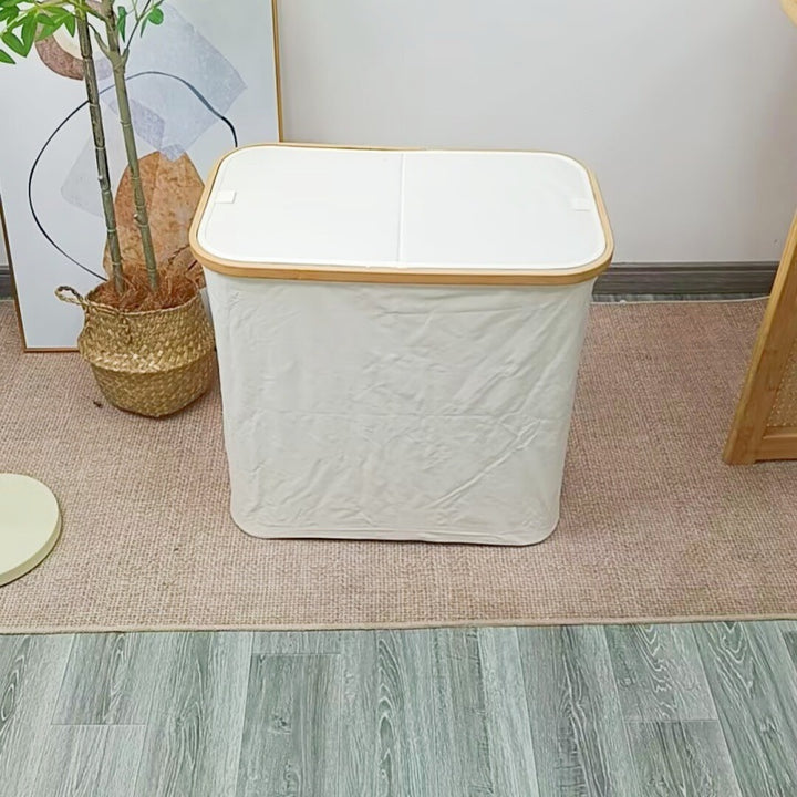 Robust laundry container with practical lid and inner pocket