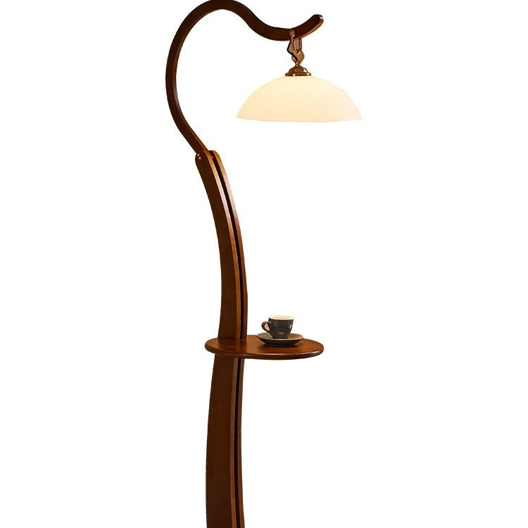 Artistic floor lamp with integrated side table