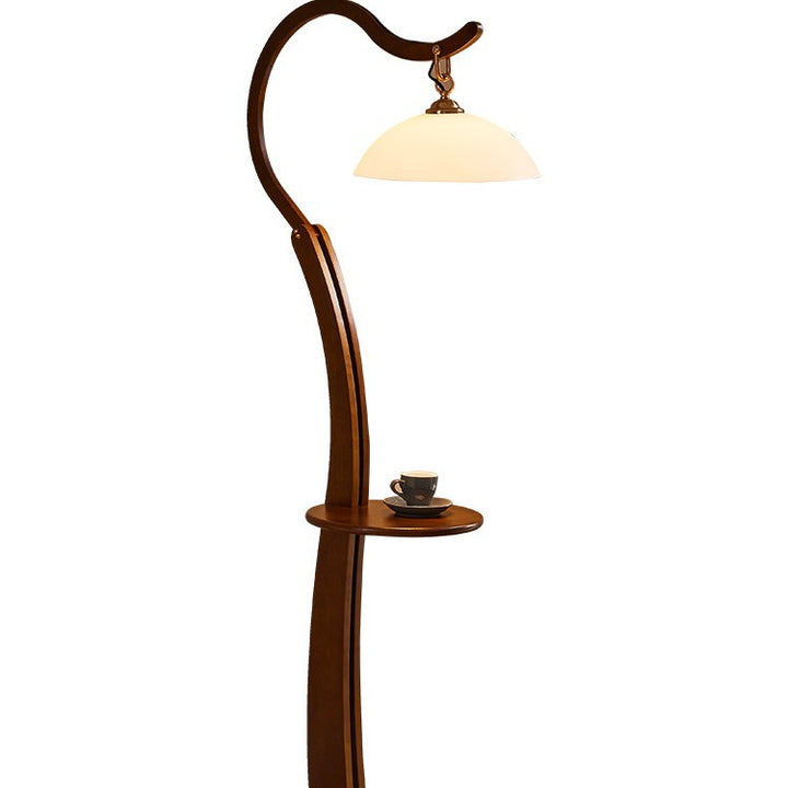 Artistic floor lamp with integrated side table