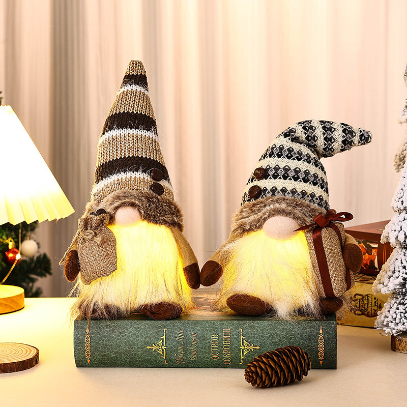 Decorative Christmas gnome with gift package