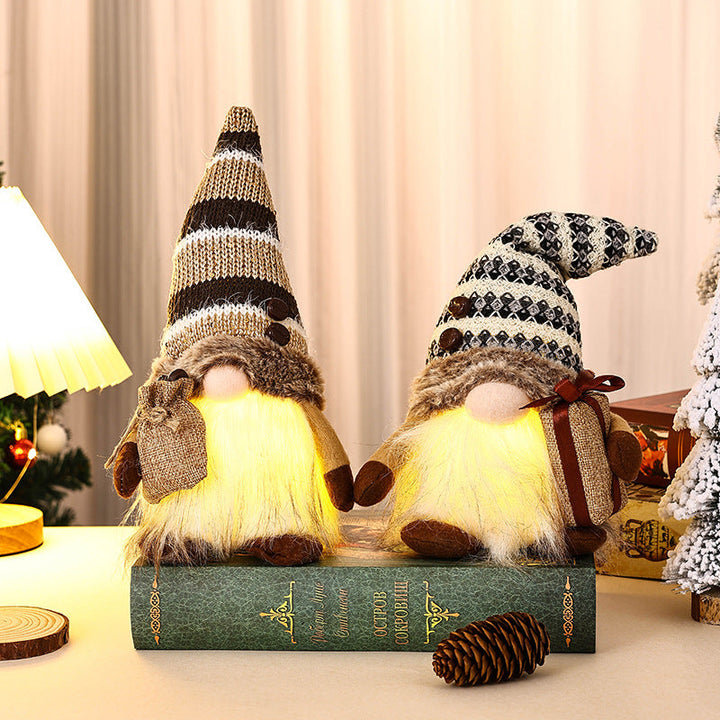 Decorative Christmas gnome with gift package