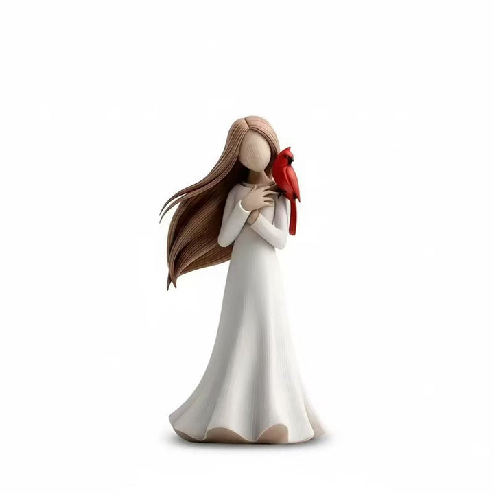 Figurine Holding Bird