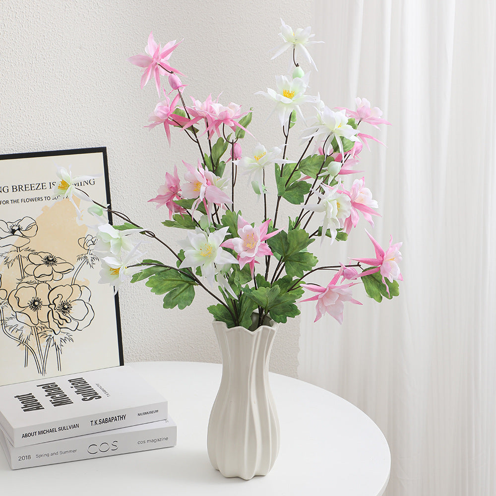Artificial bouquet with intricate flowers and leaves