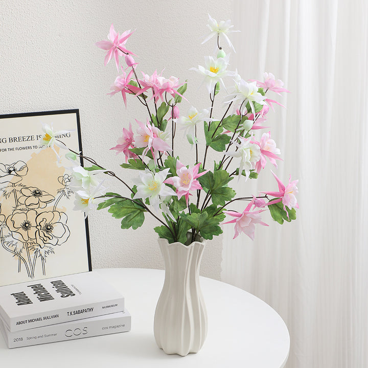 Artificial bouquet with intricate flowers and leaves
