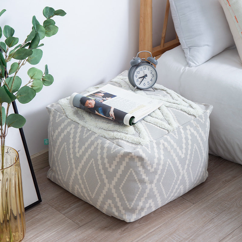 Cubical seat pouf made of woven cotton blend with ethnic diamond pattern