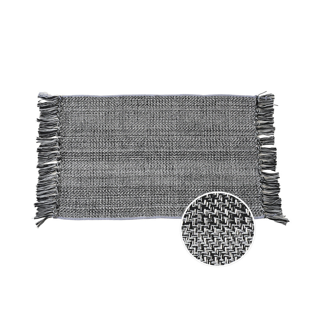 Woven table runner with dense herringbone jacquard and fringes