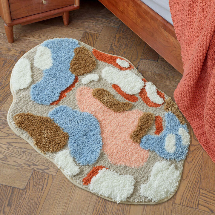 High-pile bathroom rug in organic shape with abstract textured pile