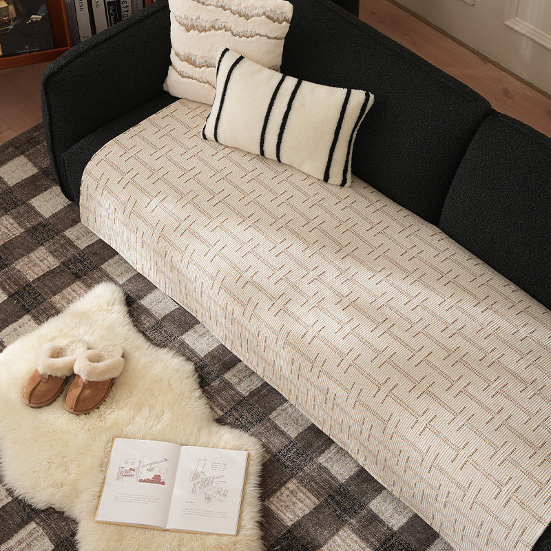 Woven rectangular table runner made of cotton blend with checkered pattern and striped border