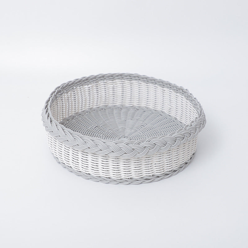 Handwoven storage basket with decorative edge
