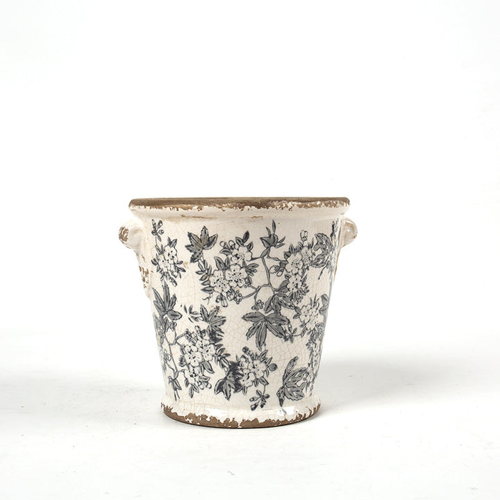 Decorative flower pot with floral embellishments