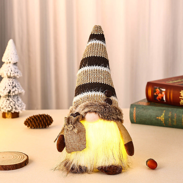 Decorative Christmas gnome with gift package