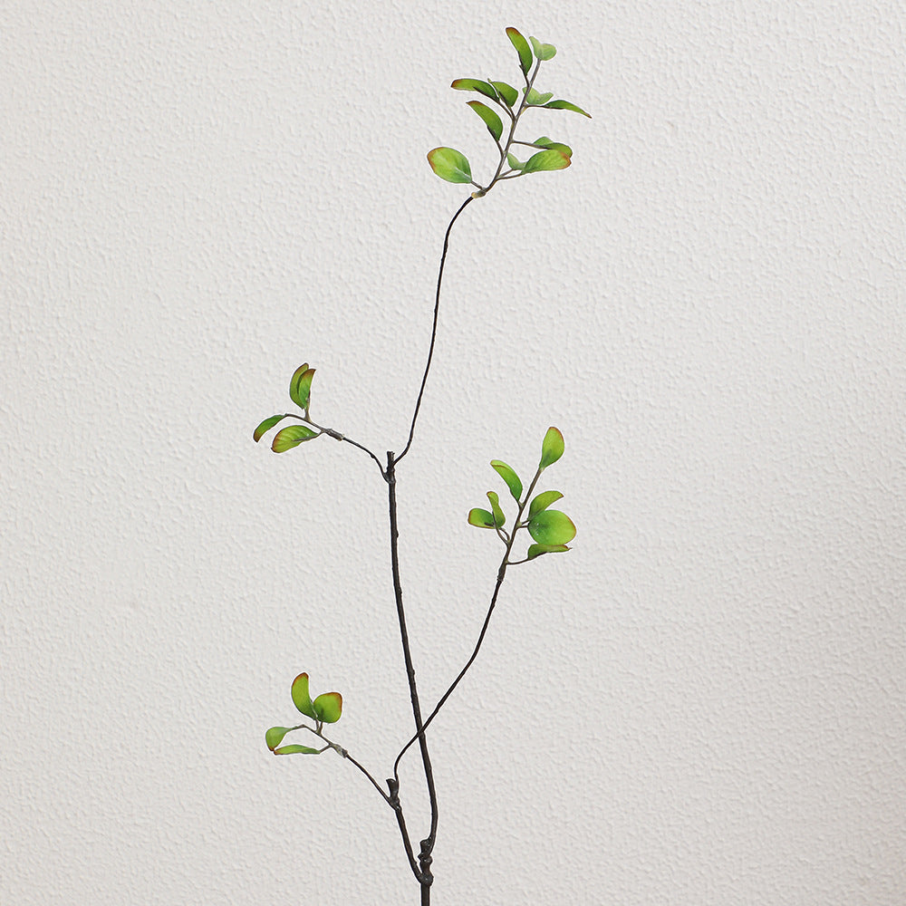 Artificial flower branch with vibrant orange flowers