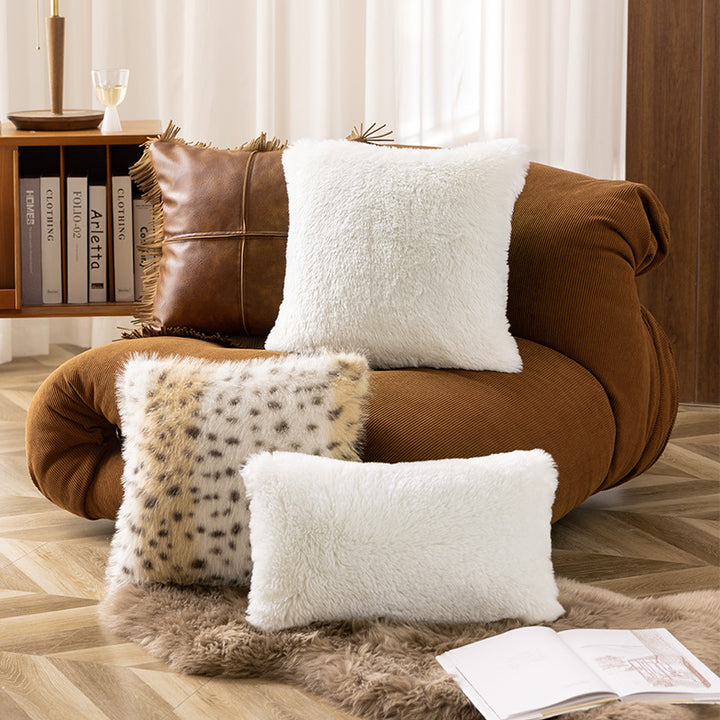 High pile rectangular cushion made of artificial fur with fine texture and zipper
