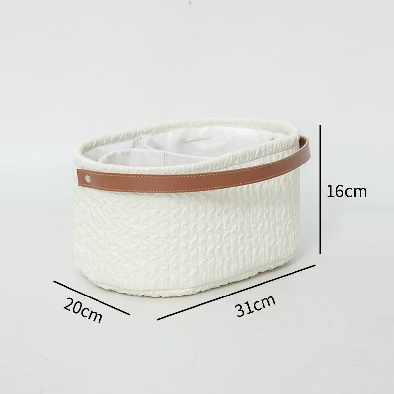 Elegant storage basket with faux leather handle