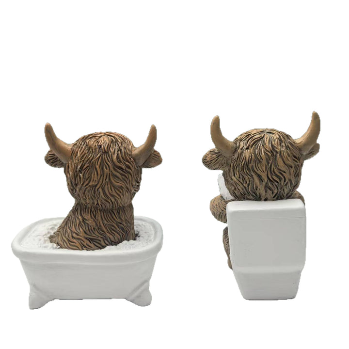 Funny decorative figure of a Highland cow in a bathtub