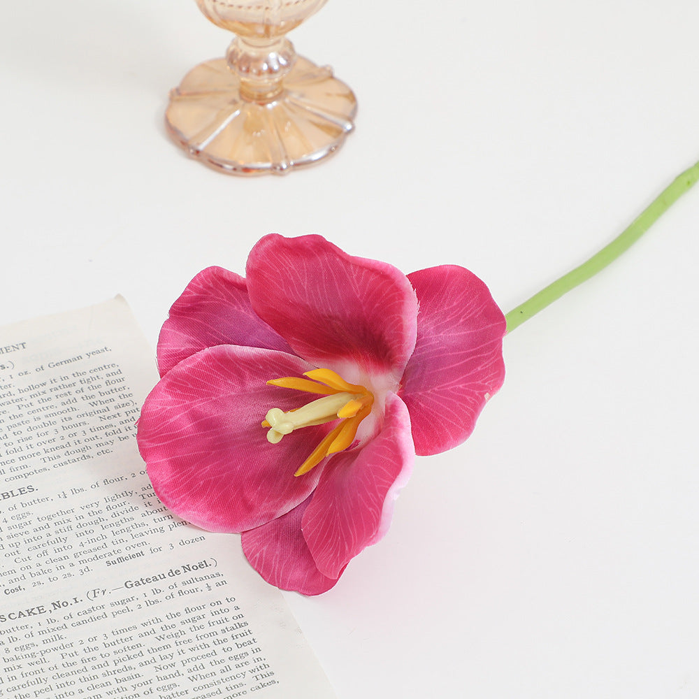 Artificial orchid flower branch with intricately detailed flowers