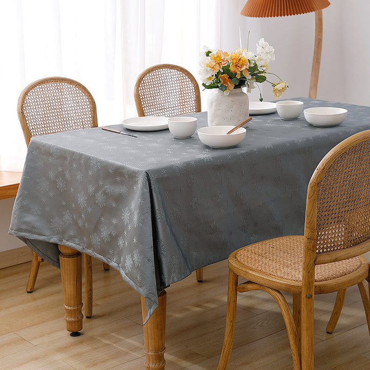 Rectangular premium table linen made of jacquard polyester with subtle frost floral embossing