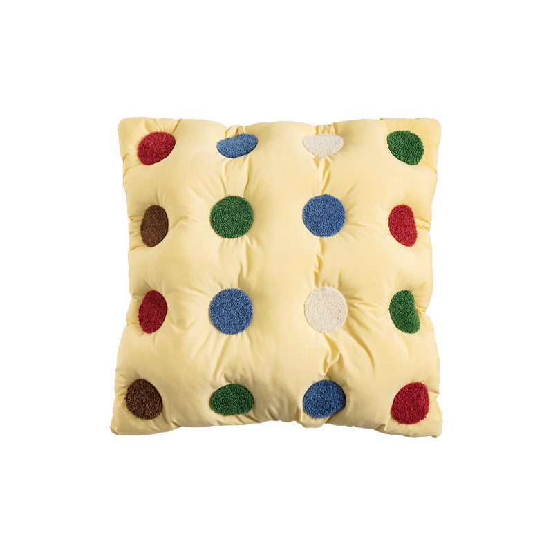 Filled decorative cushion with colorful tuft diamonds and padded structure