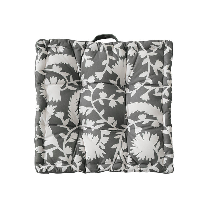 Padded chair cushion with carrying handle and decorative stitching