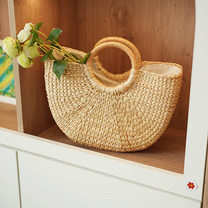 Handmade beach bag made of braided rattan