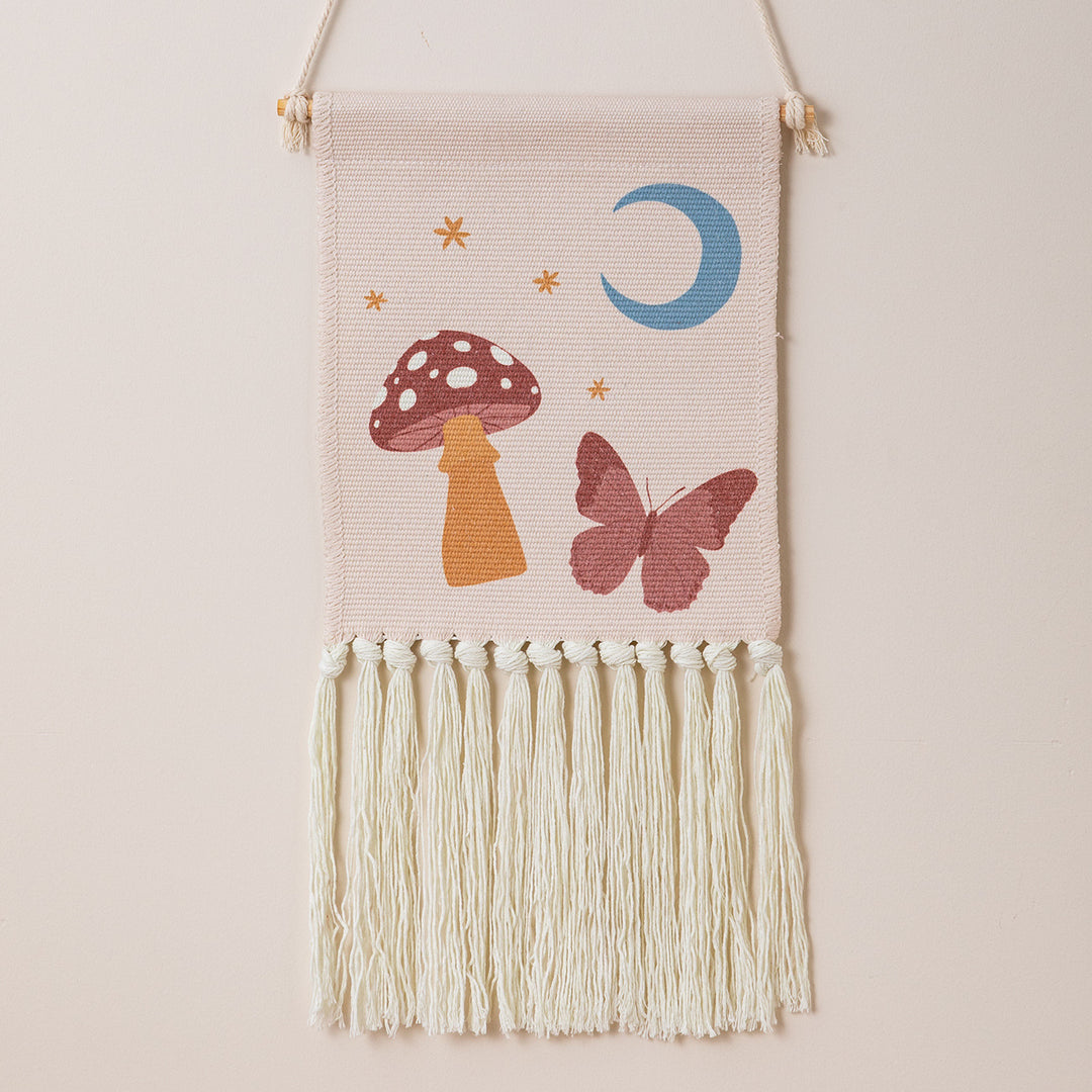 Woven wall hanging with hand-knotted fringes and bunny motif