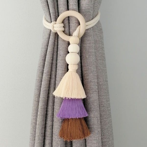 Decorative curtain holder with tassels
