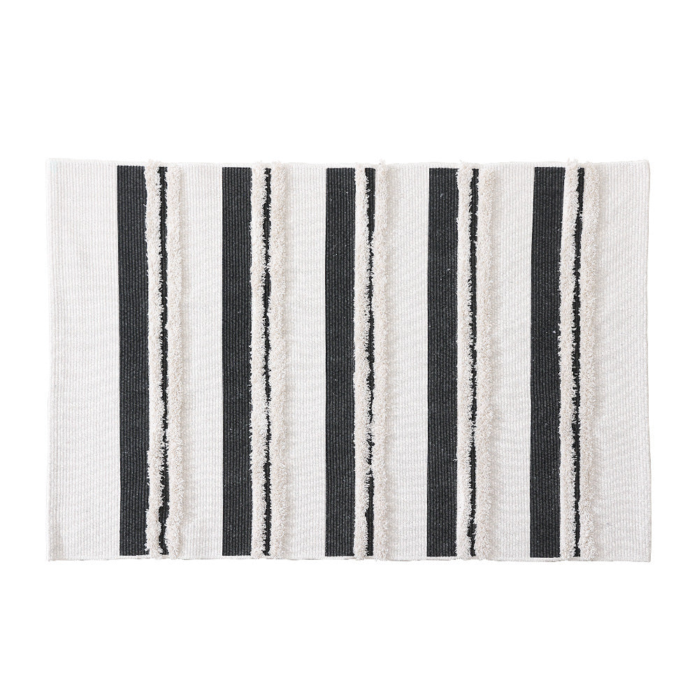 Cotton bath mat with textured stripes and fringes