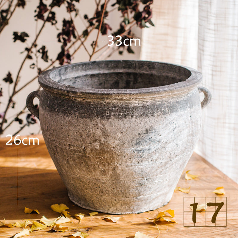 Rustic ceramic pot with handmade design
