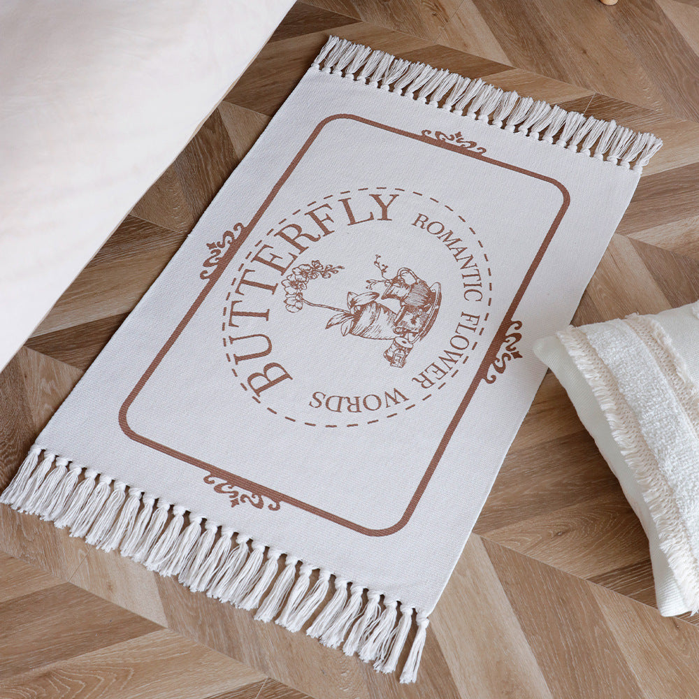 Decorative table runner made of cotton with botanical bird print and fringes