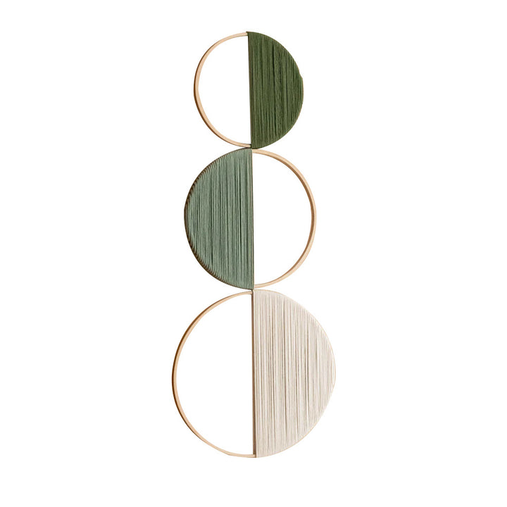 Modern wall art piece made of macrame and wood