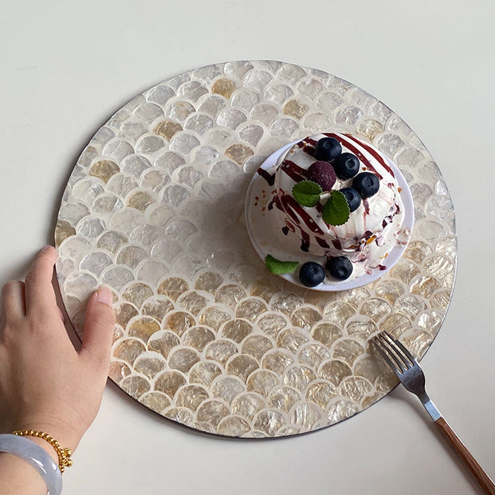 Round serving board made from noble shells