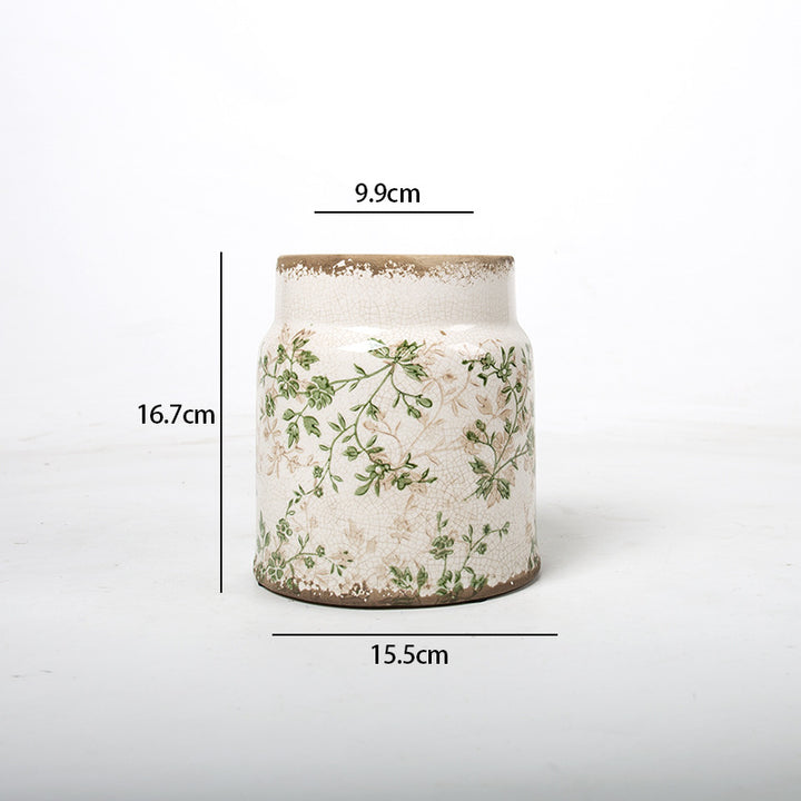 Decorative flower pot with floral decoration