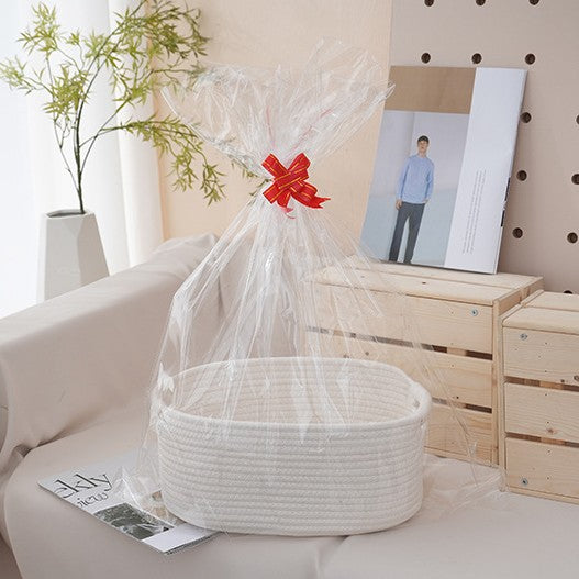 Natural storage basket with ribbons